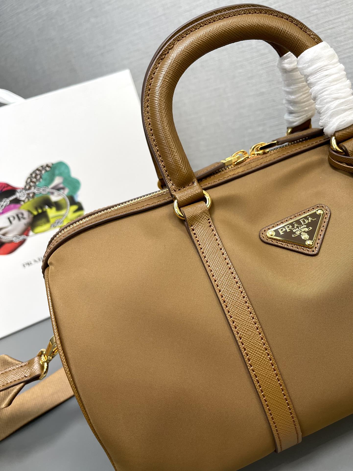 Prada Re Edition 1978 medium ReNylon And Saffiano Leather Top Handle Bag Cork Beige 1BB233